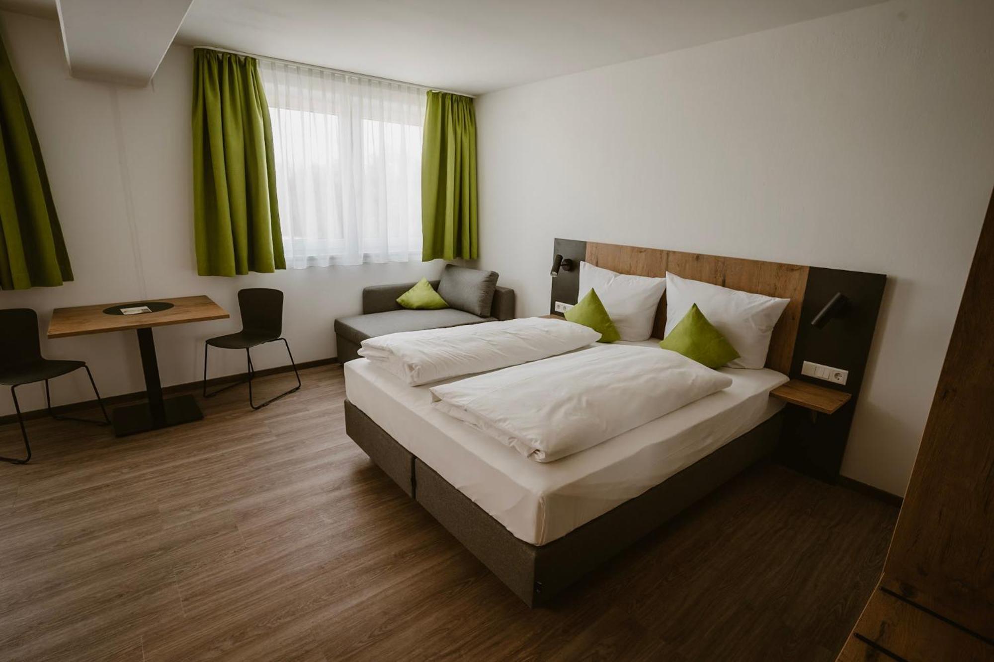Toging am Inn Motel Sleep Inn מראה חיצוני תמונה
